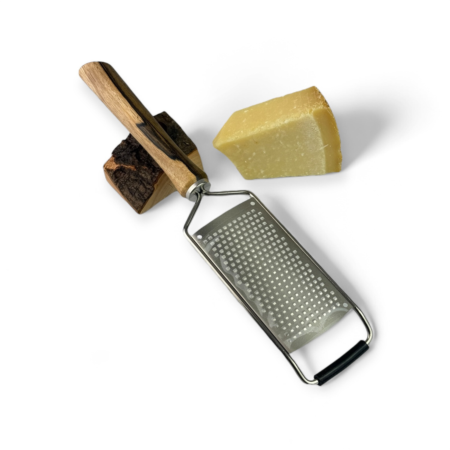 Käse- und Parmesanreibe aus Nussbaum Käse- und Parmesanreibe aus Nussbaum