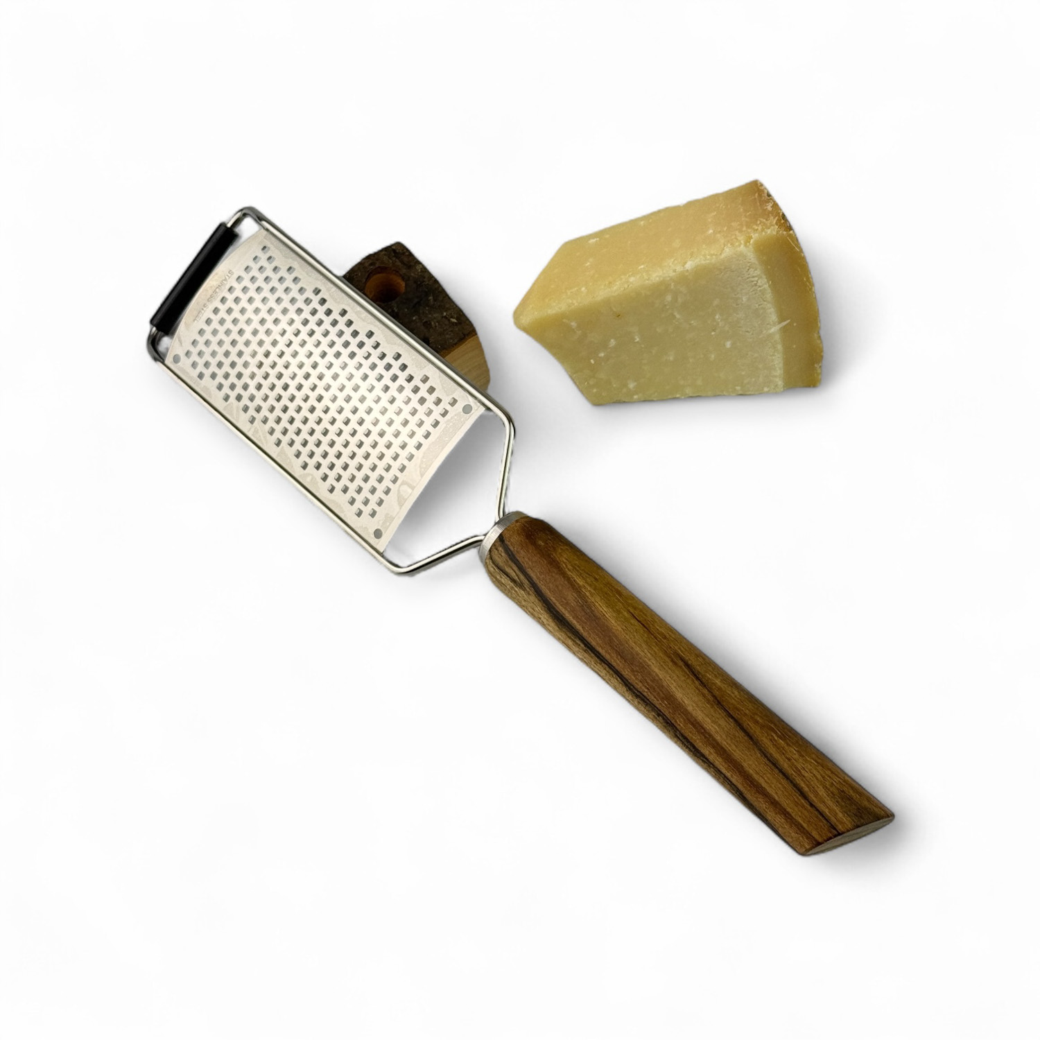 Käse- und Parmesanreibe aus Nussbaum Käse- und Parmesanreibe aus Nussbaum